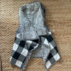 Reversible pocketed sherpa vest